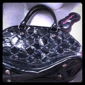 Preloved hello kitty loungefly, $30